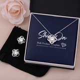 ShineOn, Love Knot earings &  Necklace with brilliant 14k white gold over stainless steel, surrounding a dazzling 6mm cubic zirconia crystal, 18-22 inch